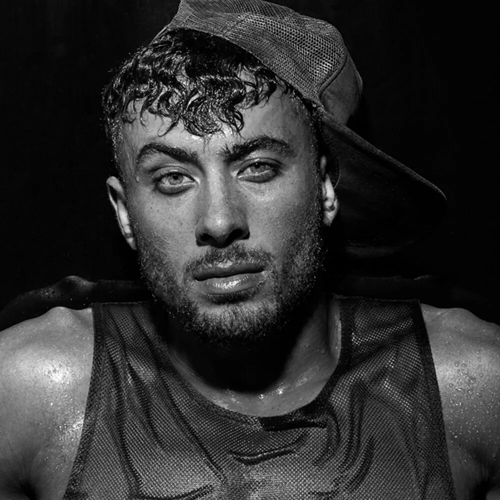 Black and white portrait in a cap